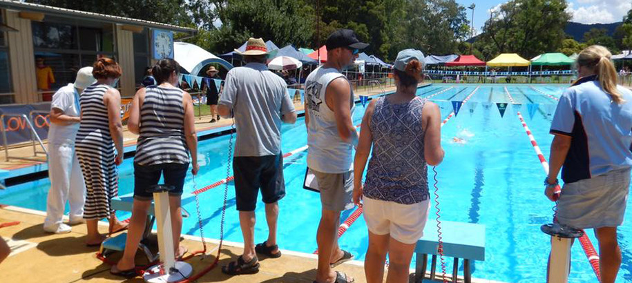 Club Committee members timekeeping at a regional pool in NSW