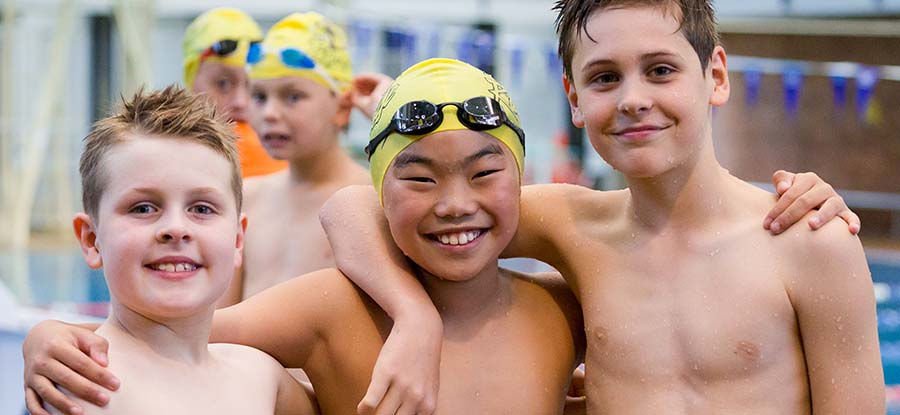 culturally diverse swimmers at a swim league event membership base